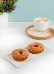 Soft and fluffy sugar-coated donuts that melt in your mouth, delivering a delightful burst of sweetness in every bite.