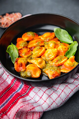 ravioli beef pesto sauce tomato sauce meal food snack on the table copy space food background rustic top view