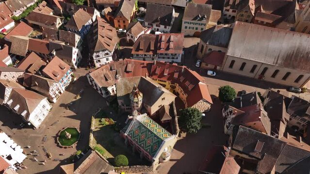 Aerial Drone Shot of Eguisheim village in the Alsace province, France. Picturesque village in a Sunny Summer Day