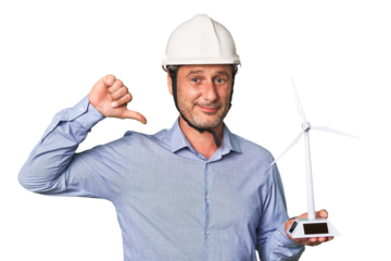A middle-aged architect man holding a windmill model feels proud and self confident, example to follow.