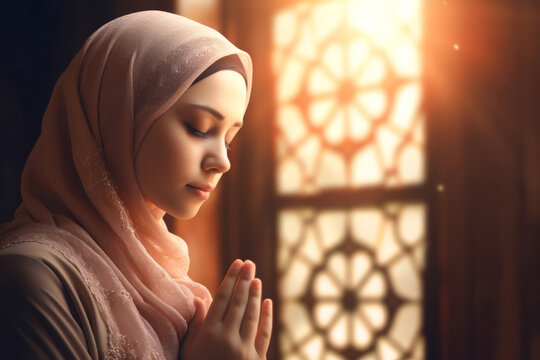 A portrait of a muslim woman praying