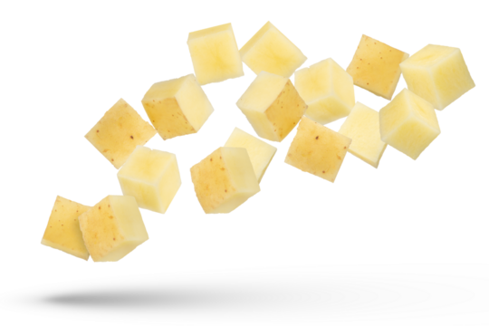 Flying vegetables. Flying potato cubes isolated on white background. Diced fresh potato isolate.