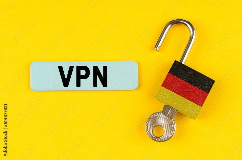 Aufkleber on the yellow surface is an open lock with a key and a sticker with the inscription - vpn