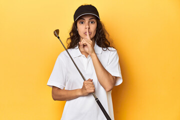Golfer woman with cap, golf polo, yellow studio, keeping a secret or asking for silence.