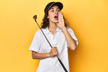 Golfer woman with cap, golf polo, yellow studio, shouting and holding palm near opened mouth.