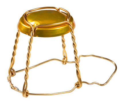 Metal wire basket from a champagne cork on an isolated background.