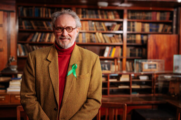 Therapist standing with mental health ribbon and copy-space