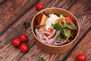 salad with ricotta bell pepper and italian bread on a wooden table with tomatoes 1