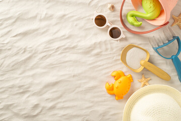 Top view photograph featuring a beach setting with panama hat, sand toys for sandcastle, seashells...