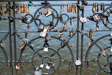 Padlocks on the bridge. Symbol of love, trust and family. The tradition of hanging a padlock on the wedding day.