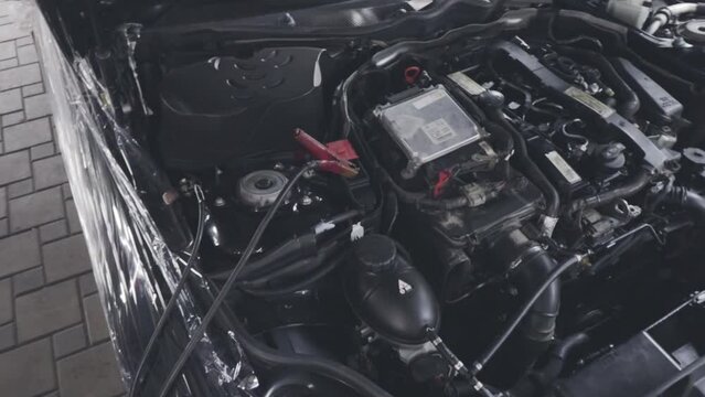 car charging battery in car service