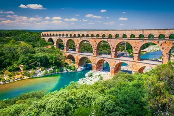 Foto op Plexiglas Pont du Gard Pont du Gard, France. Ancient three-tiered aqueduct, built in Roman Empire times on the river Gardon, Provence.