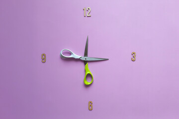 Time crunch. Unusual clock face with with scissors hour hands. Time for study. Watch face with the...