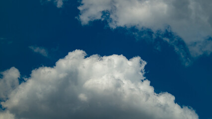 Fluffy clouds. Fluffy white clouds. Blue sky and white clouds