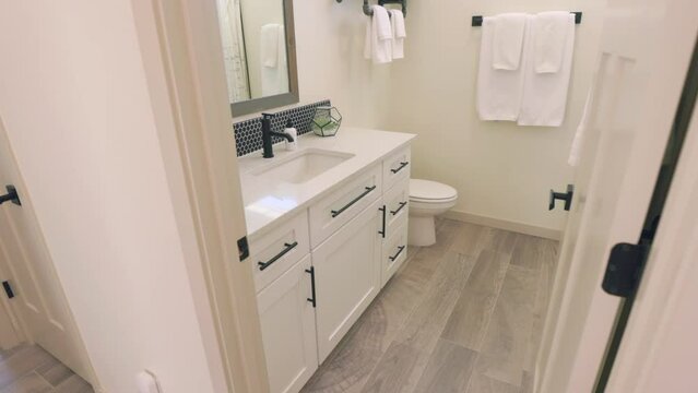 Bathroom Entrance Doorway Walk In. slow motion view entering a second bathroom with nice decoration