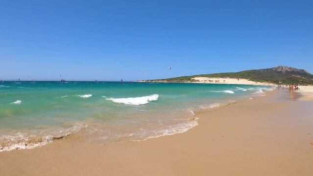 Kitesurfing on Valdevaqueros beach, Gibraltar Strait in Tarifa, Spain on June 17, 2023