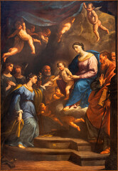 NAPLES, ITALY - APRIL 23, 2023: The painting of  Stigmatization of St. Catherine of Siena in the church Basilica di Santa Maria della Sanita by Andrea Vaccaro (1604 – 1670).	

