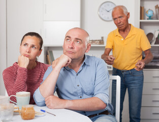 Wife comforting husband after a family conflict. High quality photo