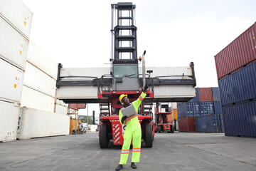African American engineer they are working in container area  logistics transportation import export or shipping industry , delivery  and logistics concept container truck  transport or free-zone area