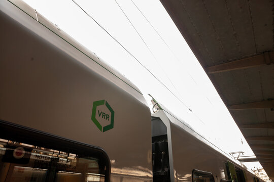 WUPPERTAL, GERMANY - NOVEMBER 11, 2022: Logo of VRR, or Verkehrsverbud Rhein Ruhr, on a S-Bahn suburban train in Wuppertal. VRR is the public transportation association of the land of NRW.