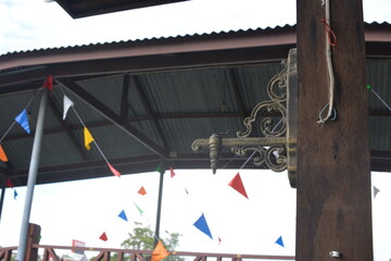 decorative iron on wooden poles
