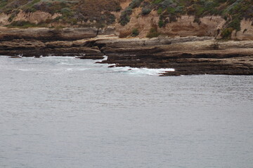 waves crashing into rocks