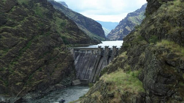 Hells Canyon Dam on Snake River in Idaho aerial view in spring time