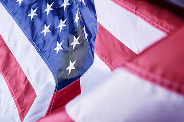 closeup shot of the waving flag of the United States of America with interesting textures