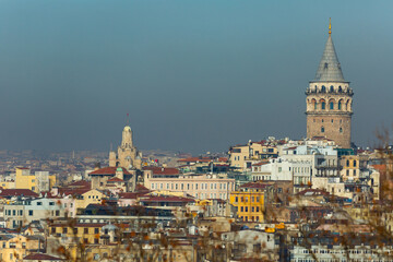 Fototapeta premium Scenic view of Karakoy quarter and Galata Tower from Golden Horn Bay on winter day, Istanbul, Turkey