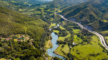 view of the valley of the mountains and river 