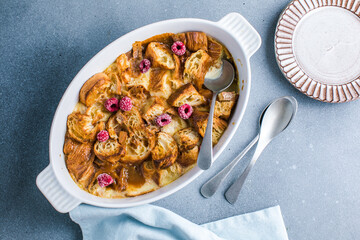 Croissant bread pudding with custard creamy sauce and vanilla ice cream very delicious dessert