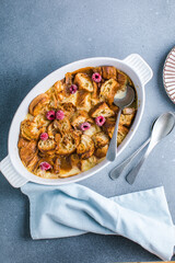 Croissant bread pudding with custard creamy sauce and vanilla ice cream very delicious dessert
