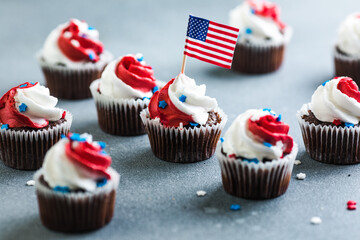Independence Day Fourth of July USA American patriotic party with american symbols. Cupcakes dessert decorated cream cheese or buttercream.