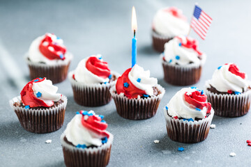 Independence Day Fourth of July USA American patriotic party with american symbols. Cupcakes dessert decorated cream cheese or buttercream.