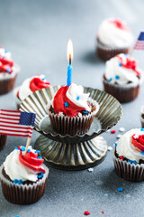 Independence Day Fourth of July USA American patriotic party with american symbols. Cupcakes dessert decorated cream cheese or buttercream.