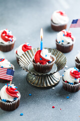 Independence Day Fourth of July USA American patriotic party with american symbols. Cupcakes dessert decorated cream cheese or buttercream.