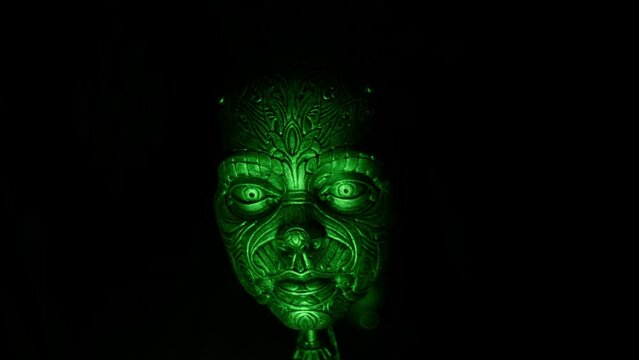 Steam punk robotic human face illuminated by green glowing light, 4K