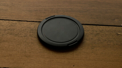 cover camera lens upside down on the table