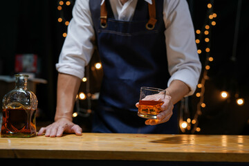Bartender Serve Whiskey, on wood bar, 