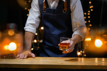 Bartender Serve Whiskey, on wood bar, 