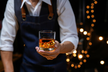 Bartender Serve Whiskey, on wood bar, 
