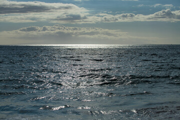Obraz premium Sea water in rippled water detail background. Ocean waves pattern.