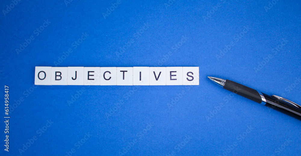 Aufkleber pen and alphabet letters with objective words. objective concept or goal direction of something
