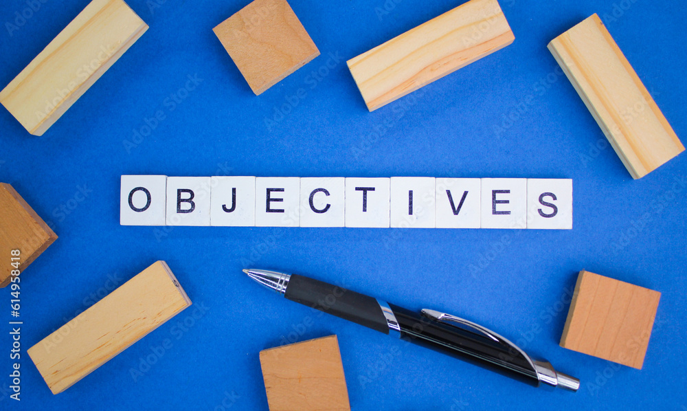 Aufkleber pen and alphabet letters with objective words. objective concept or goal direction of something