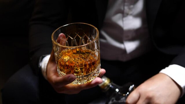 Businessmen in suits drinking  Celebrate whiskey