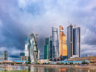 High buildings of Moscow-City at Moskva River at summer sunset, Russia.