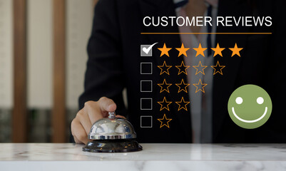 Customer experience satisfied concept, silver service bell on hotel reception desk with happy...