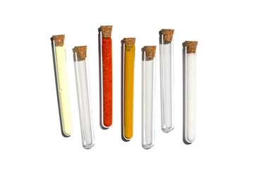 Sulfur Powder, Potassium Ferricyanide, Organic Curcuma Powder and Di-Ammonium Phosphate in test tube with cork cap. Cosmetic chemicals ingredient on laboratory table. Top View