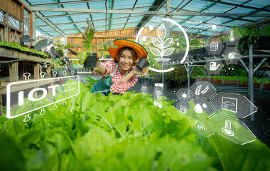 Obraz na płótnie Canvas The farmer girl equipped with IoT technology harnesses the power of real time data and connectivity to revolutionize her agricultural practices and maximize yields.