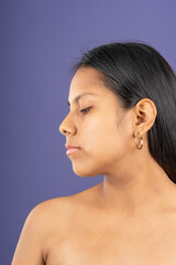 Young woman in left profile